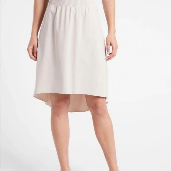 Athleta Cosmic hi-low knee - high beige skirt  size Medium - Picture 1 of 8